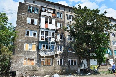 Жилой дом, пострадавший от артобстрела